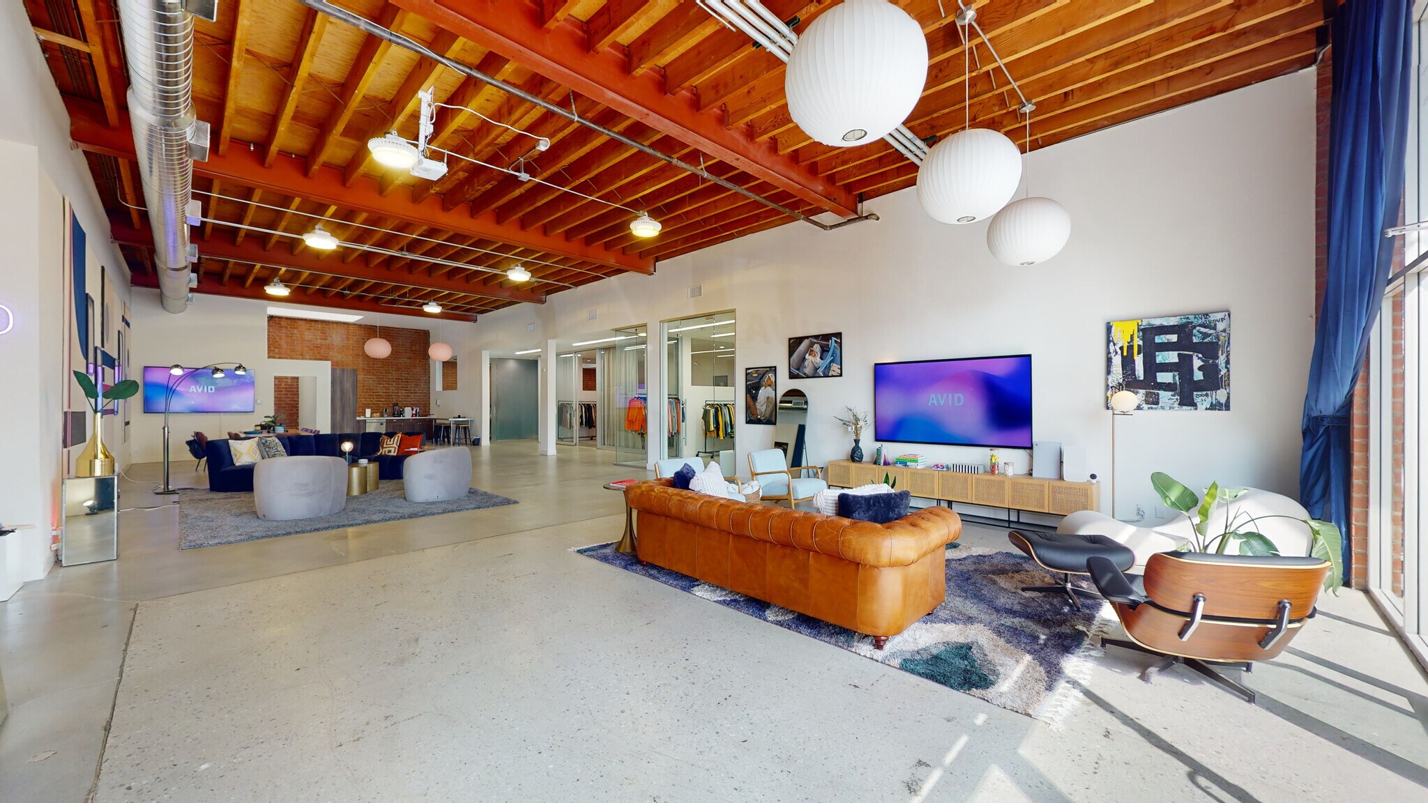 Creative loft suite at 1520 Cloverfield with bow-truss ceilings
